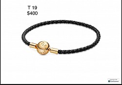 pulsera negra con dorado
